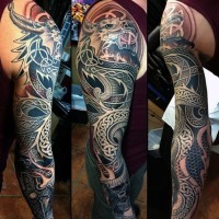 Original Celtic style painted black and white fantasy dragon tattoo on sleeve