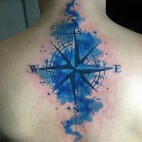 Original colored nautical star tattoo on upper back