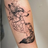Original combined black and white fox tattoo on forearm stylized with geometrical figures