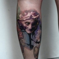 Original designed and colored leg tattoo of rose stylized with old woman face