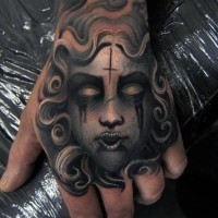 Original designed colored crying mystical woman tattoo on hand