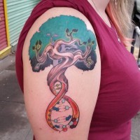 Original DNA shaped colored tree tattoo on shoulder