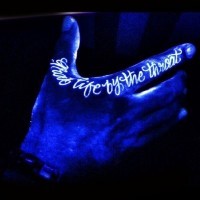 Original lettering white ink luminescence tattoo on fingers