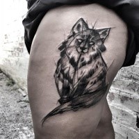 Original looking black ink painted by Inez Janiak thigh tattoo of big cat
