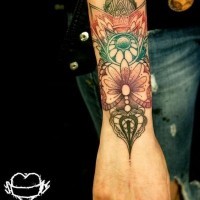 Original multicolored floral like tattoo on wrist