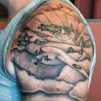 Original painted black and white military planes tattoo on upper arm