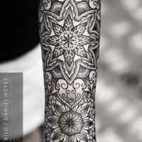 Original painted black ink flowers with ornaments tattoo on wrist