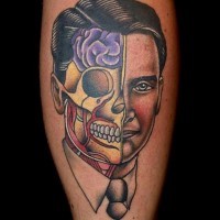 Original X-Ray style painted colored portrait tattoo on leg