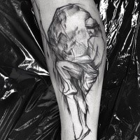 Painted by Inez Janiak tattoo of man with big rock