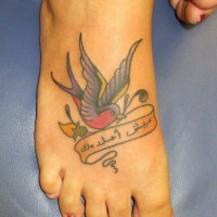 Painted colorful tattoo bird with ribbon idea