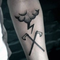 Pair of crossed axes and rainy cloud with flash tattoo on arm