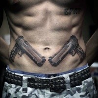 Pair of guns with lettering Love Hope gangsta style tattoo on lower belly