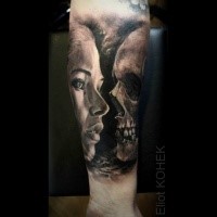 Photo like detailed forearm tattoo of woman portrait stylized with skull