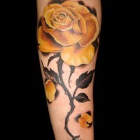 Photorealistic yellow rose tattoo