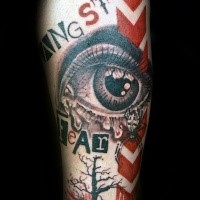Photoshop style colored arm tattoo of human eye with lettering and spider
