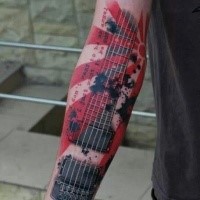 Photoshop style colored forearm tattoo of guitar with lettering
