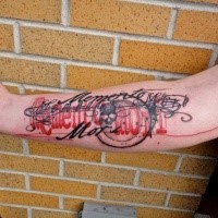 Photoshop style colored forearm tattoo of cool looking lettering