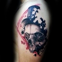 Photoshop style colored shoulder tattoo of human skull with hat