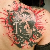 Photoshop style colored shoulder tattoo of human skull with eye and key