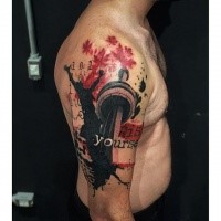 Photoshop style colored shoulder tattoo of various statues and leaves