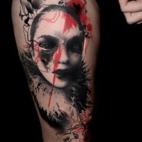 Photoshop style colored thigh tattoo of creepy woman mask