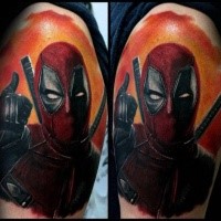 Picture like colored shoulder tattoo of angry Deadpool