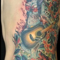 pin up ragazza zombi con chitarra tatuaggio