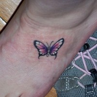 Pink small butterfly tattoo on ankle