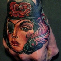 Pirate girl tattoo on hand by lars uwe