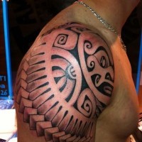 Polynesian stye black and white shoulder armor tattoo