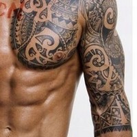 Polynesian style black and white massive tattoo on shoulder and chest