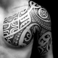 Polynesian tribal style ornament dark black ink tattoo on arm and chest