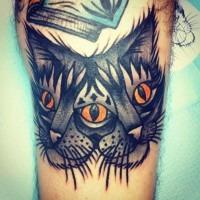 Portrait of a cat with two heads tattoo