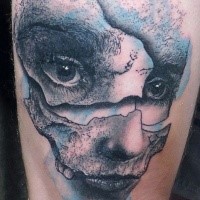 Portrait style colored arm tattoo of corrupted woman face