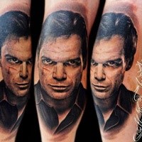 Portrait style colored arm tattoo of creepy Dexter face