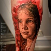 Portrait style colored forearm tattoo of girl portrait