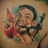 Portrait style colored scapular tattoo of man with knife and tomatoes