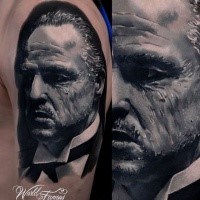 Portrait style colored shoulder tattoo of God Father