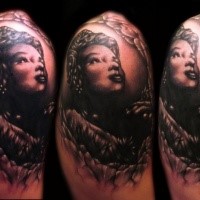 Portrait style colored shoulder tattoo of old woman face
