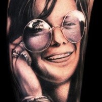 Portrait style colored tattoo of beautiful woman face with glasses