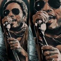 Portrait style colored tattoo of Jimmy Hendrix