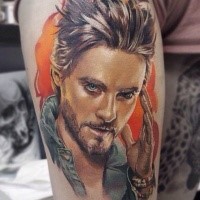 Portrait style colored thigh tattoo of realistic man portrait