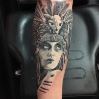 Portrait style very detailed forearm tattoo of Aztec woman face