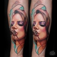 Pretty young woman drinking from bottle colored portrait tattoo in new school style on arm