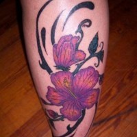Purple hibiscus flowers tattoo on leg