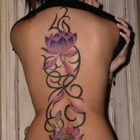 Purple lotuses with black patterns tattoo on back for women