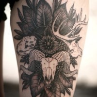Ram tattoo in leaves with flowers
