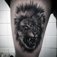 Real photo like black ink roaring tiger tattoo on thigh