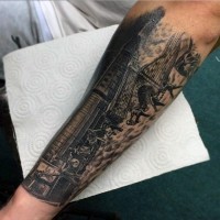 Real photo like black ink train with people tattoo on arm