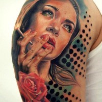 Real photo like colored seductive smoking woman tattoo on shoulder